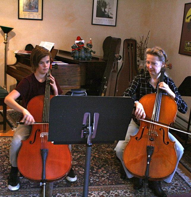 Kimberlee teaching a student cello lesson in Boulder, CO